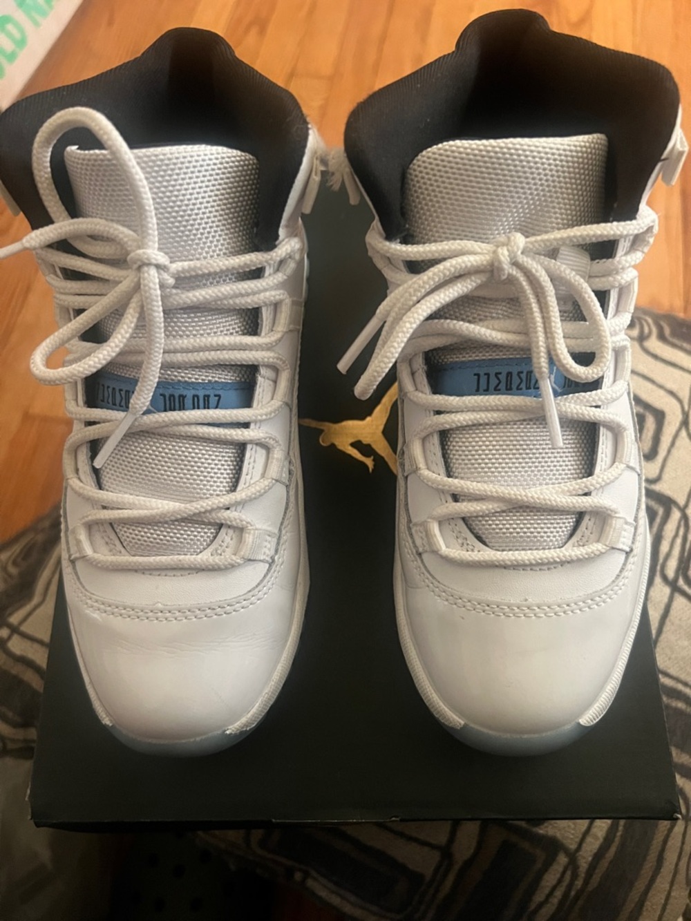 Jordan Kids White High-Top Sneakers with Light Blue Accents size 2.5